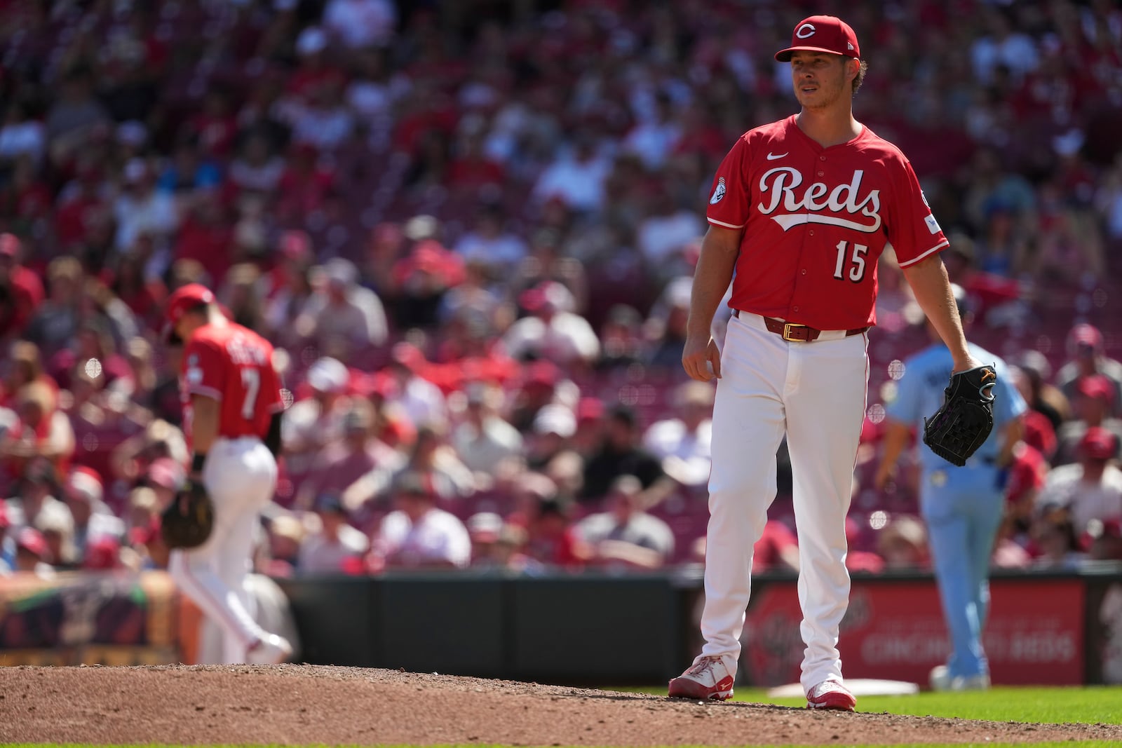 Cincinnati Reds' Emilio Pagán (15) reacts after surrendering a two-run home run to Toronto Blue Jays' Bo Bichette in the ninth inning of a baseball game Monday, Sept. 1, 2025, in Cincinnati. (AP Photo/Kareem Elgazzar)