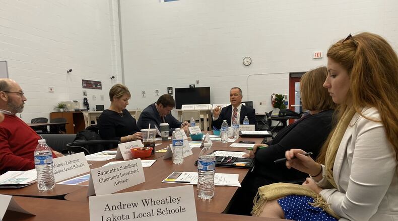 Lakota Schools will launch their own version of the popular business reality TV show “Shark Tank” next school year for participating students at Lakota West and Lakota East high schools. The new program is part of series of new, business instruction courses designed by a joint group (pictured) of area business leaders and school officials. Students will present their business ideas to a panel of judges for a chance of earning investment money, said Lakota school officials. (Provided Photo/Journal-News)