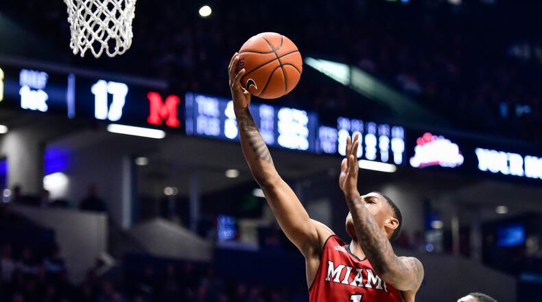 Miami’s Nike Sibande goes up to the basket during their basketball game against Xavier Wednesday, Nov. 28 at Xavier’s Cintas Center in Cincinnati. Xavier won 82-55. NICK GRAHAM/STAFF
