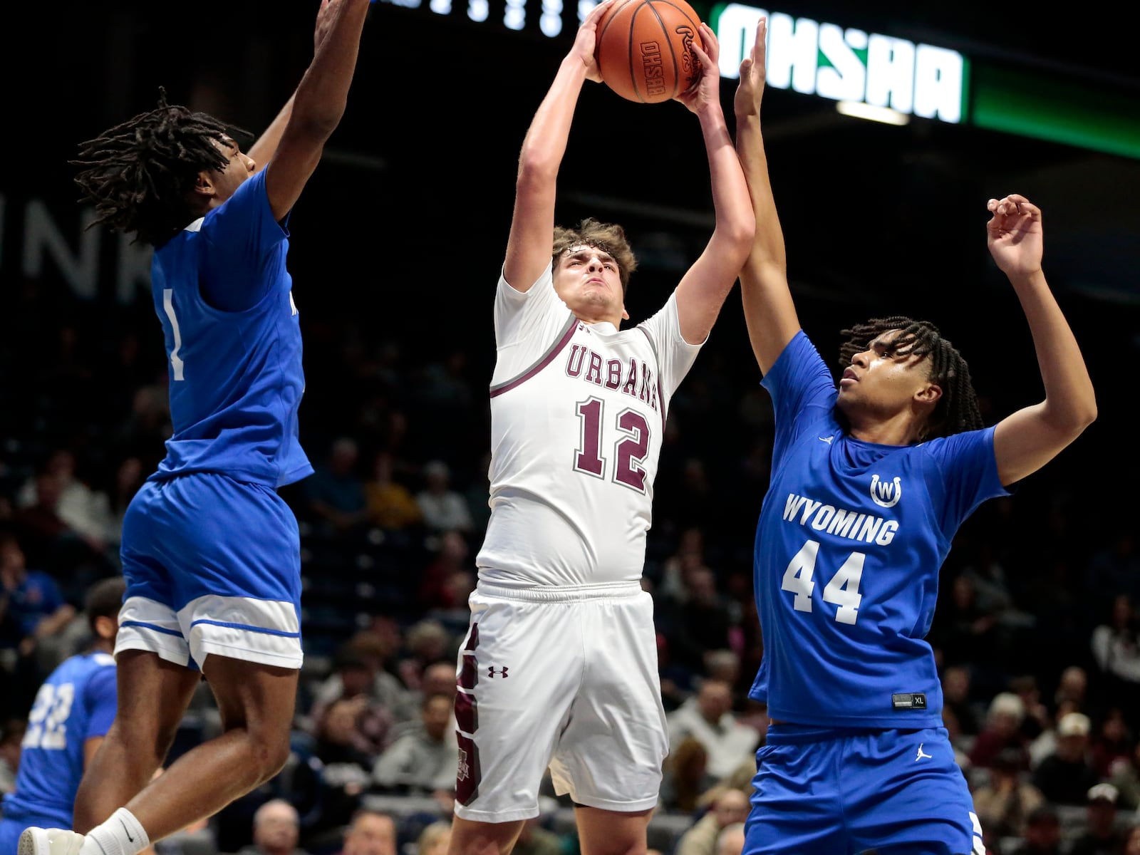 Fight through traffic for a rebound is Urbana junior Kaden Underwood during a Division IV district title game Sunday, March 8, 2026, at the Cintas Center in Cincinnati. Wyoming won 59-31. STEVEN WRIGHT / STAFF.