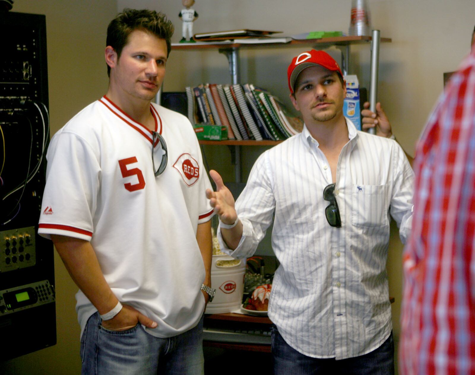 Nick and Drew Lachey stop by the WLW radio booth during Opening Day for the Cincinnati Reds. Staff photo by Greg Lynch