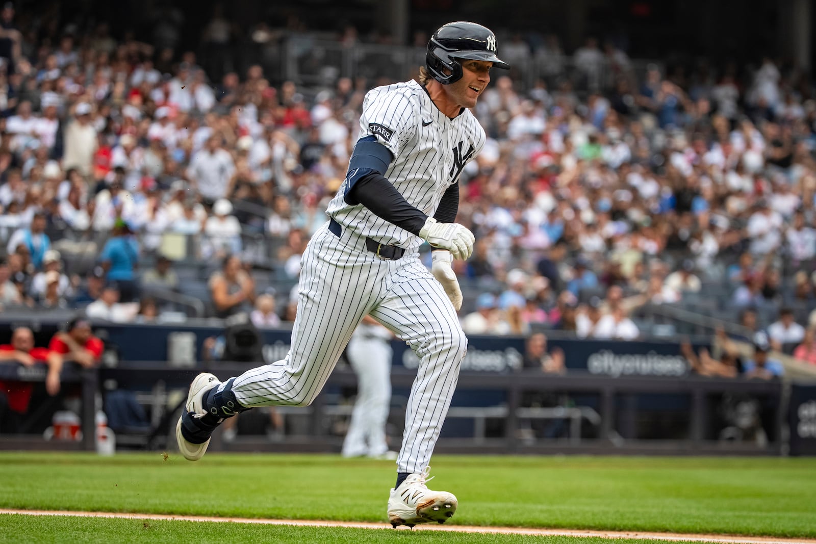 New York Yankees' Ryan McMahon runs after hitting a two-run double during the second inning of a baseball game against the Philadelphia Phillies, Sunday, July 27, 2025, in New York. (AP Photo/Angelina Katsanis)
