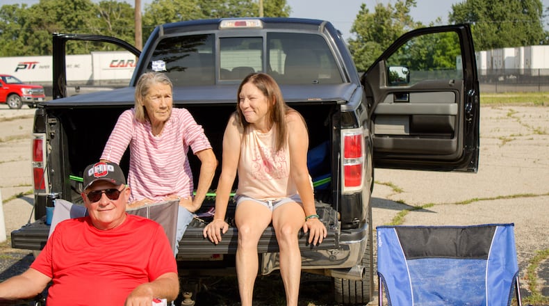 Dave, Lisa and Mandy Chamberlain backed their truck up to the parade route to watch the Middletown Independence Day parade.