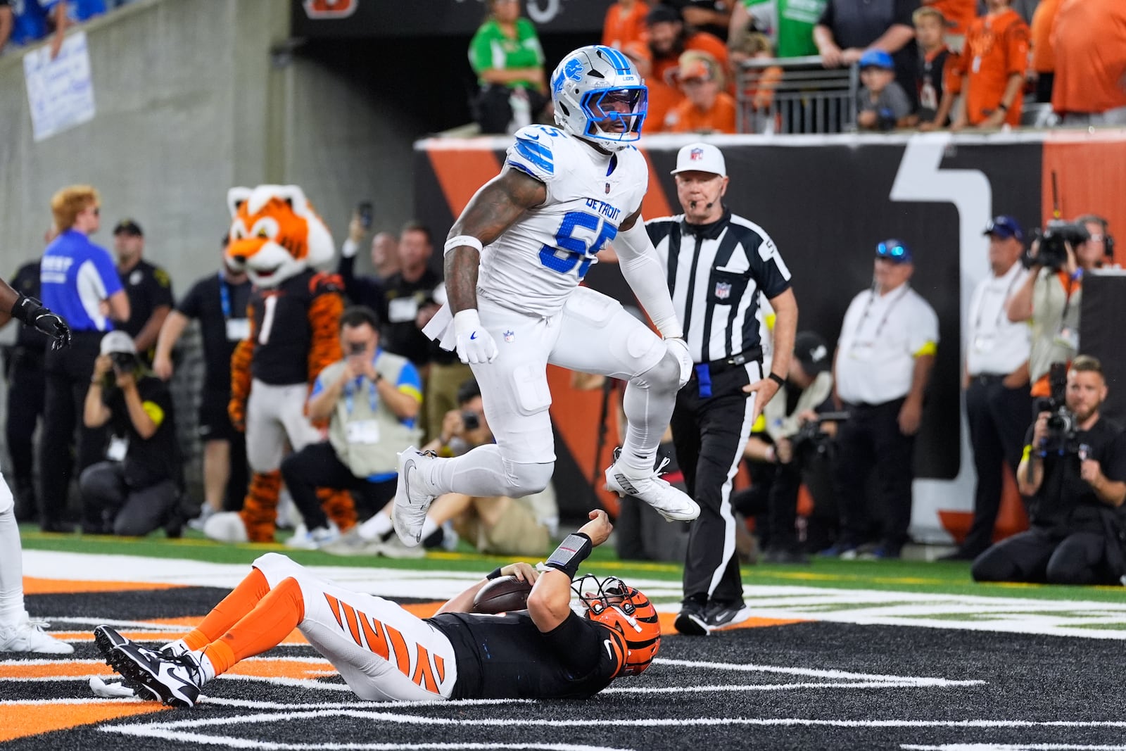 Detroit Lions linebacker Derrick Barnes (55) reacts to sacking Cincinnati Bengals quarterback Jake Browning (6) for a safety during the second half of an NFL football game Sunday, Oct. 5, 2025, in Cincinnati. (AP Photo/Carolyn Kaster)