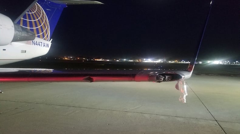 The wing of Air Wisconsin Flight 3818 on Wednesday night after the plane veered off the runway at the Dayton International Airport. CONTRIBUTED