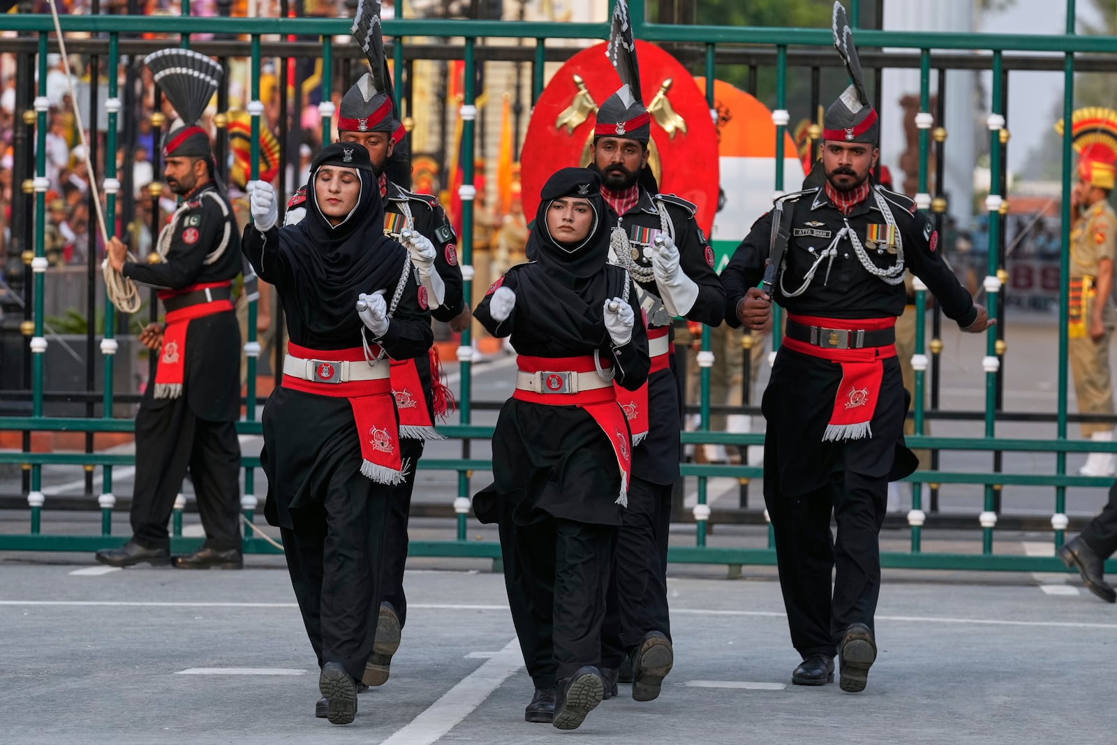 Pakistan's Rangers soldiers march during a daily closing ceremony at the Wagah, a joint post on the Pakistan and India border, near Lahore, Pakistan, Saturday, May 3, 2025. (AP Photo/K.M. Chaudary)
