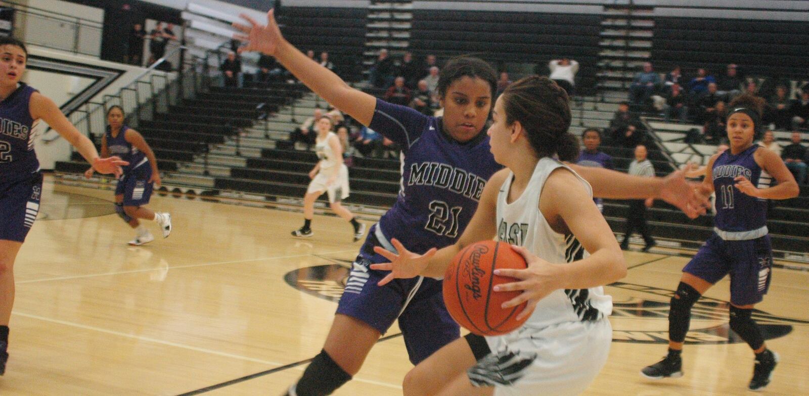 Middletown’s Kaliyah Wilson (21) pressures Lakota East’s Jordan Stanley during Wednesday night’s game in Liberty Township. The host Thunderhawks won 48-43. RICK CASSANO/STAFF