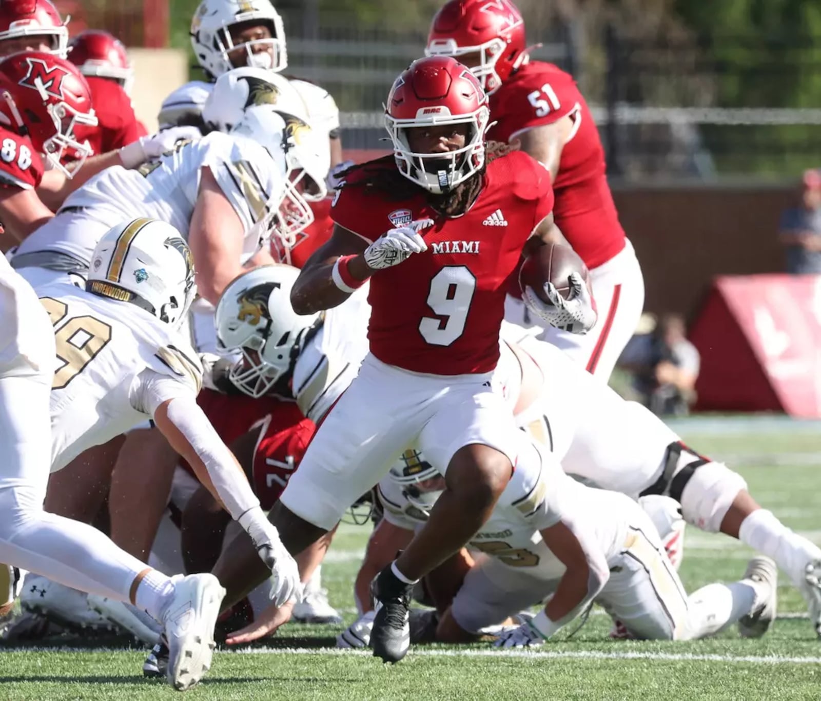 Miami running back Kenny Tracy runs for a first down against Lindenwood on Saturday at Yager Stadium. MIAMI ATHLETICS