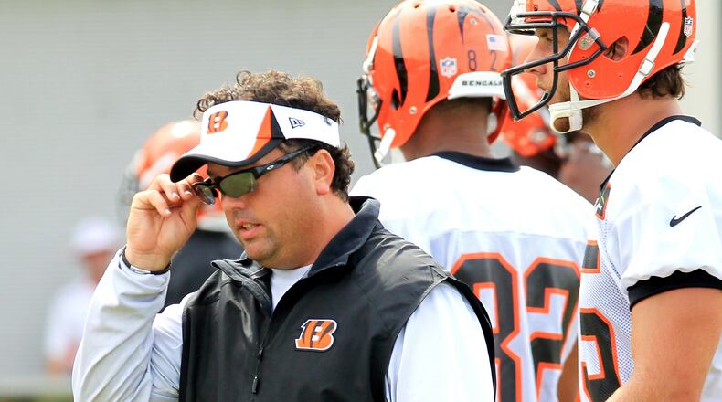 Cincinnati Bengals linebacker coach Paul Guenther walks the sideline during a session of training camp in downtown Cincinnati July 26, 2013. Guenther has been promoted to the team’s defensive coordinator. NICK DAGGY / STAFF