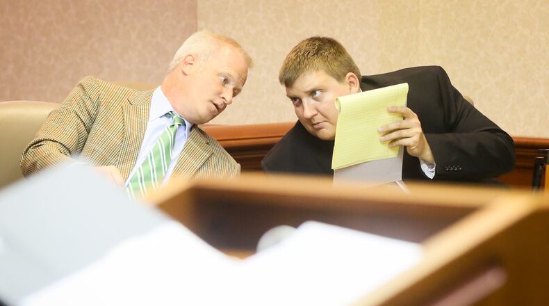 Fairfield teacher Tyler Conrad sits with his attorney Christopher Pagan during testimony in his trial, Monday, May 22. A 16-year-old Fairfield High School student testified for more than 90 minutes that Conrad touched her inappropriately in his classroom and at a Ross Twp. home. GREG LYNCH / STAFF