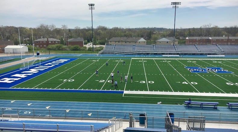 A new, $400,000 artificial sport turf was recently installed in Hamilton High School’s Virgil M. Schwarm Stadium. The plastic is the second generation playing surface for the Butler County high school. MICHAEL D. CLARK/STAFF