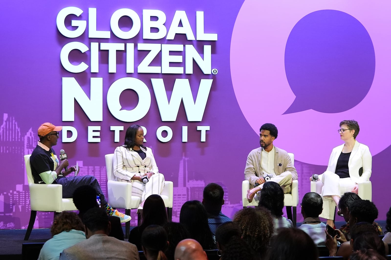 Marcus Samuelsson, from left, Isabelle Kamariza, Jon Kent, and Kate Krauss talk on a panel at a Global Citizen NOW event in Detroit, Thursday, July 10, 2025. (AP Photo/Paul Sancya)