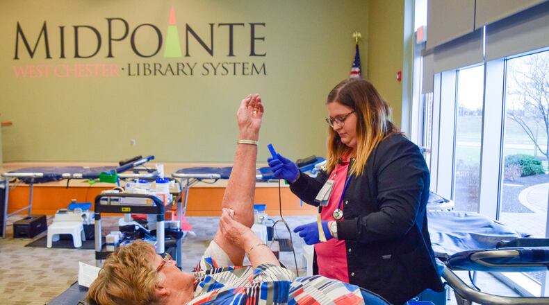 The Nov. 27 blood drive at MidPointe Library West Chester marked the four-year anniversary of Community Blood Center’s monthly blood drive partnership at MidPointe. Fairfield Township donor Peggy Eversole came to make her 84th lifetime donation. CONTRIBUTED