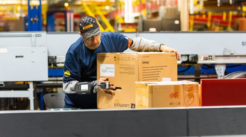 DHL is looking to fill 300 positions at its CVG hub in Northern Kentucky. CONTRIBUTED