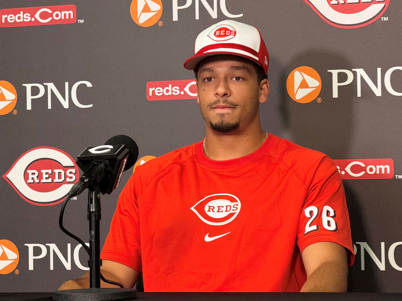 Cincinnati Reds pitcher Chase Burns speaks to the media at Great American Ball Park before a game against the New York Yankees, Monday, June 23, 2025, in Cincinnati, Ohio. (AP Photo/Joe Reedy)