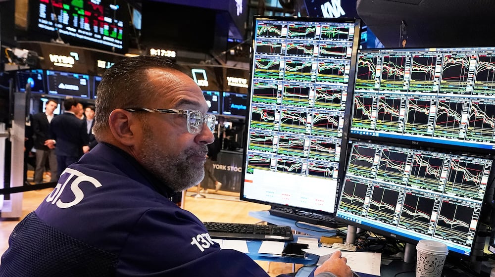 FILE - Specialist Anthony Matesic works on the floor of the New York Stock Exchange, Tuesday, May 6, 2025. (AP Photo/Richard Drew, File)