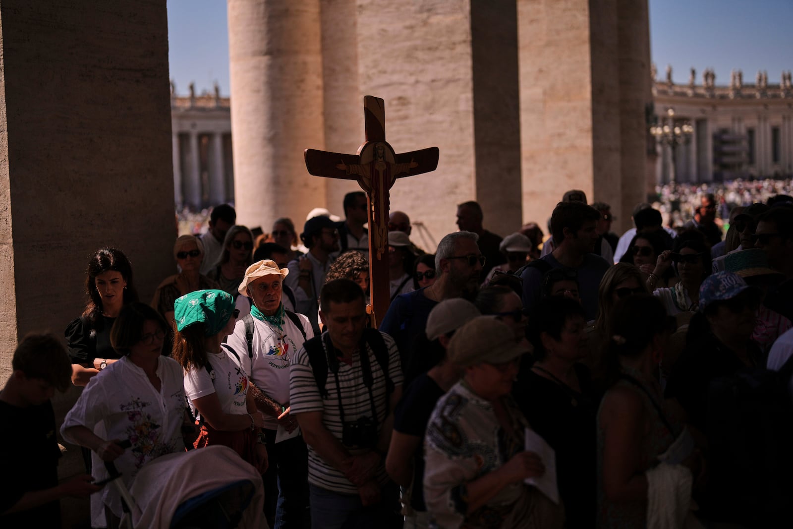 Pilgrims arrive to visit St. Peter's Basilica on the seventh of nine days of mourning for late Pope Francis, at the Vatican, Friday, May 2, 2025. (AP Photo/Francisco Seco)