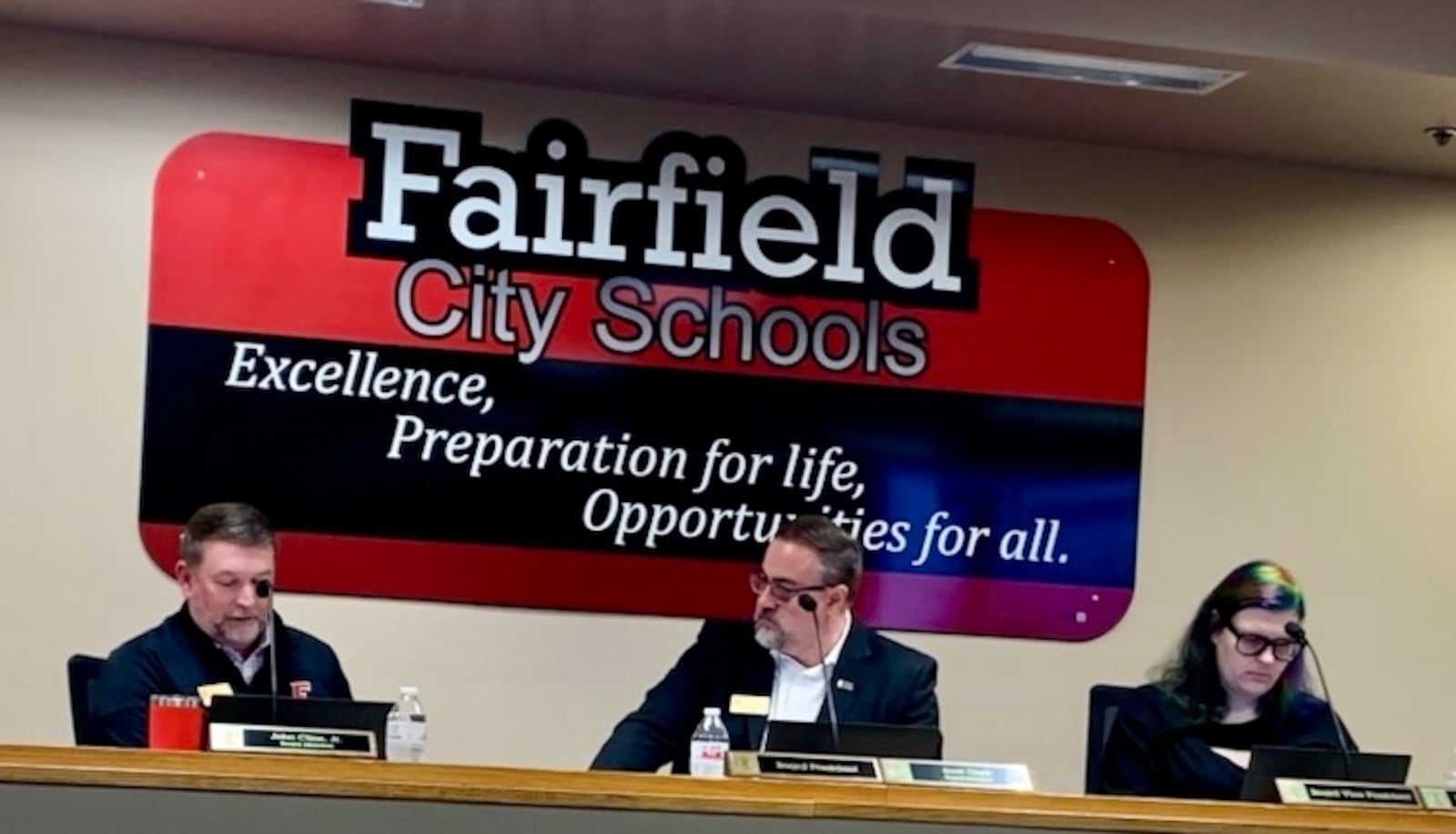 The Fairfield Board of Education, some members shown here, unanimously approved numerous budget cuts in programs and personnel, including higher student fees, during a board work session meeting. CONTRIBUTED