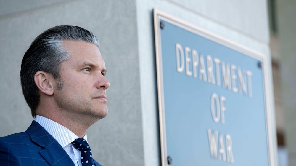 FILE - Defense Secretary Pete Hegseth stands outside the Pentagon during a welcome ceremony for the Japanese defense minister at the Pentagon in Washington, Jan. 15, 2026. (AP Photo/Kevin Wolf, File)