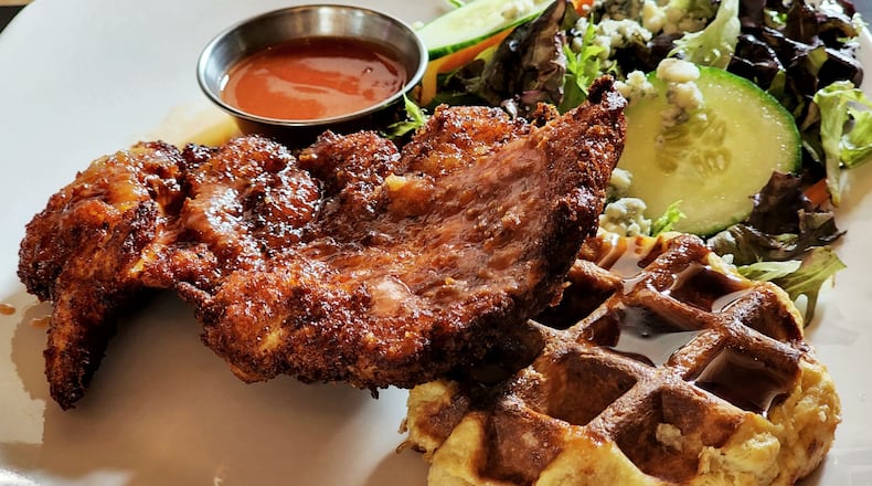 Taste of Belgium has closed its restaurant at Liberty Center in Liberty Twp., Butler County. This is their chicken and waffle served with maple syrup and hot sauce. NICK GRAHAM/STAFF