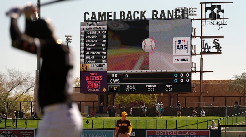 FILE - The Automated Ball-Strike System plays on the scoreboard after a pitch call was challenged during the first inning of a spring training baseball game between the Chicago White Sox and the San Diego Padres, Feb. 26, 2025, in Phoenix. (AP Photo/Carolyn Kaster, File)