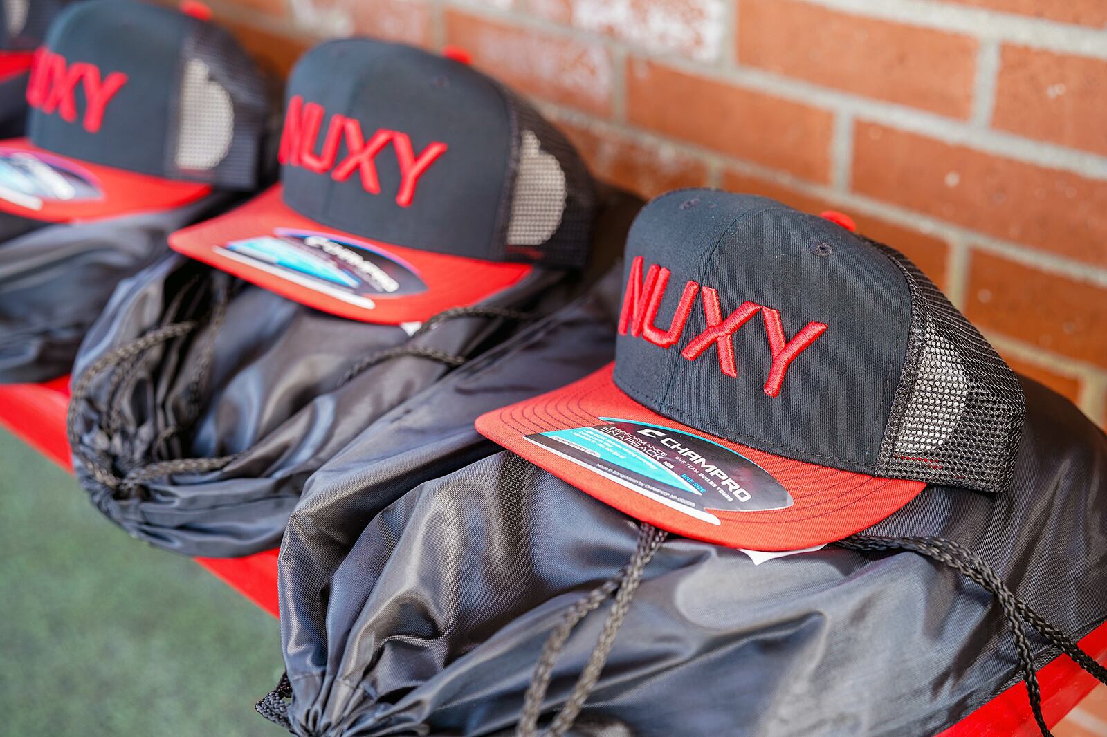 Uniforms and hats for Joe Nuxhall Miracle League team members.