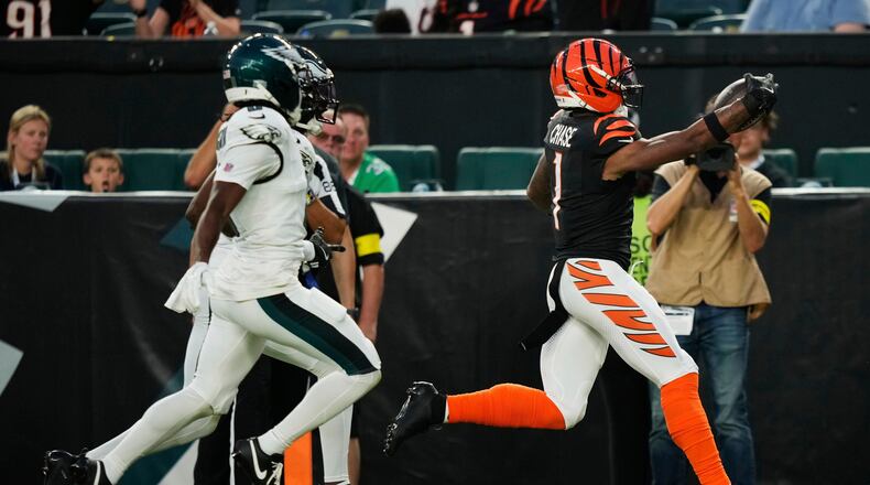 Cincinnati Bengals wide receiver Ja'Marr Chase (1) scores a touchdown during the first half of an NFL preseason football game against the Philadelphia Eagles on Thursday, Aug. 7, 2025, in Philadelphia. (AP Photo/Matt Slocum)