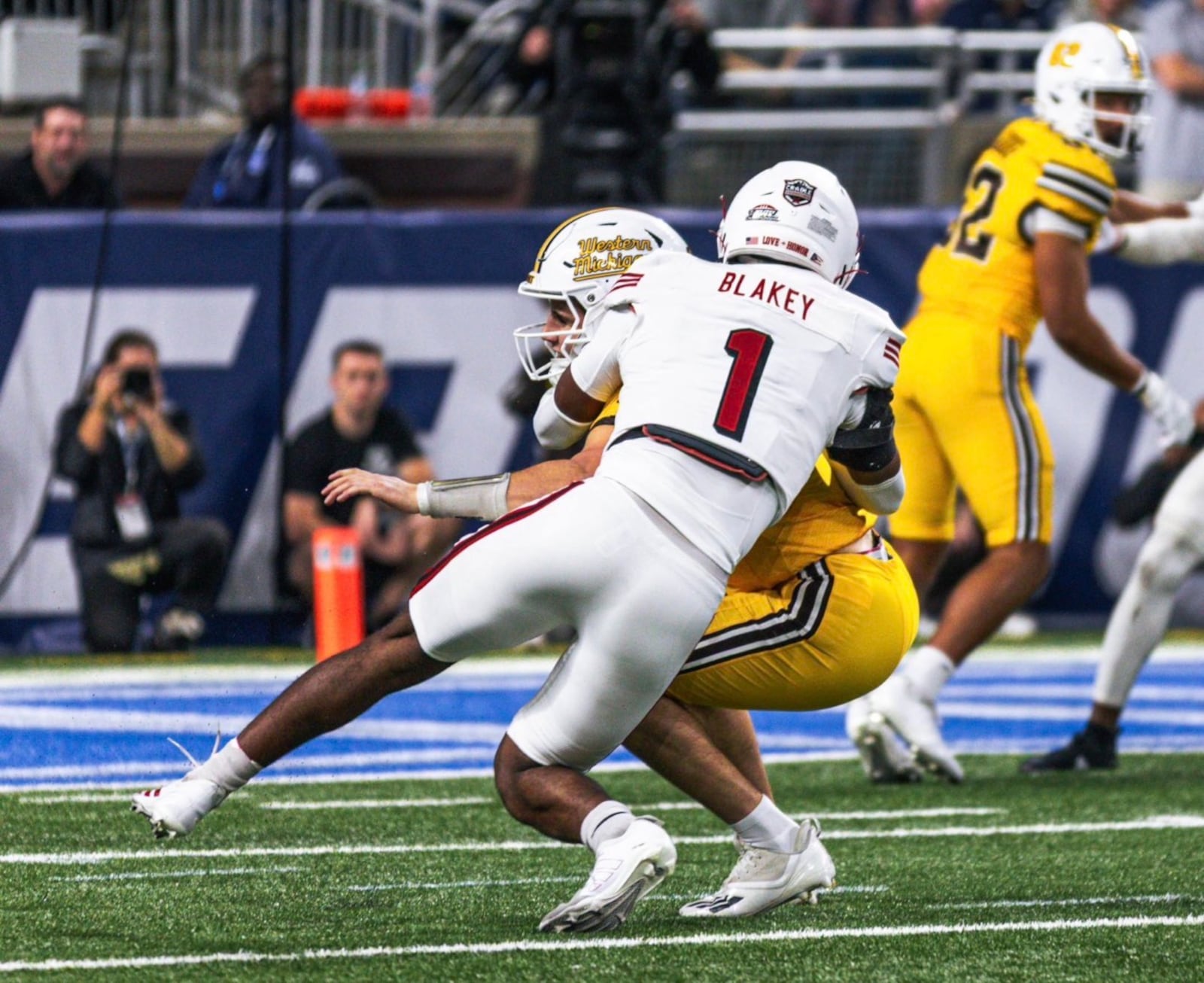 Miami’s Eli Blakey (1) makes a tackle against Western Michigan during the MAC Championship Game on Saturday at Ford Field in Detroit. MIAMI ATHLETICS