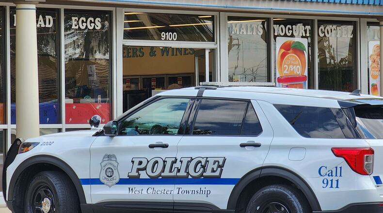 West Chester Twp. Police responded Wed., July 12, 2023 after a car crashed through the front of UDF at Cincinnati Dayton and West Chester roads. NICK GRAHAM/STAFF