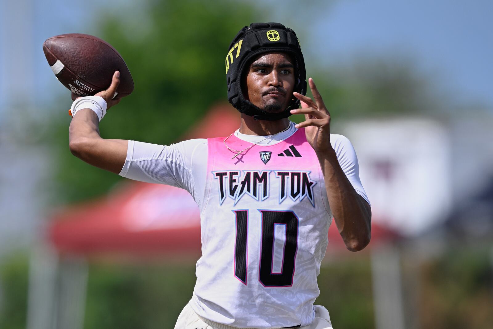 FILE - Team Toa quarterback Madden Iamaleava (10) throws during the OT7 Championships football tournament, Sunday, June 9, 2024 in Tampa, Fla. (Phelan M. Ebenhack/AP Content Services for the NFL via AP, FIle)
