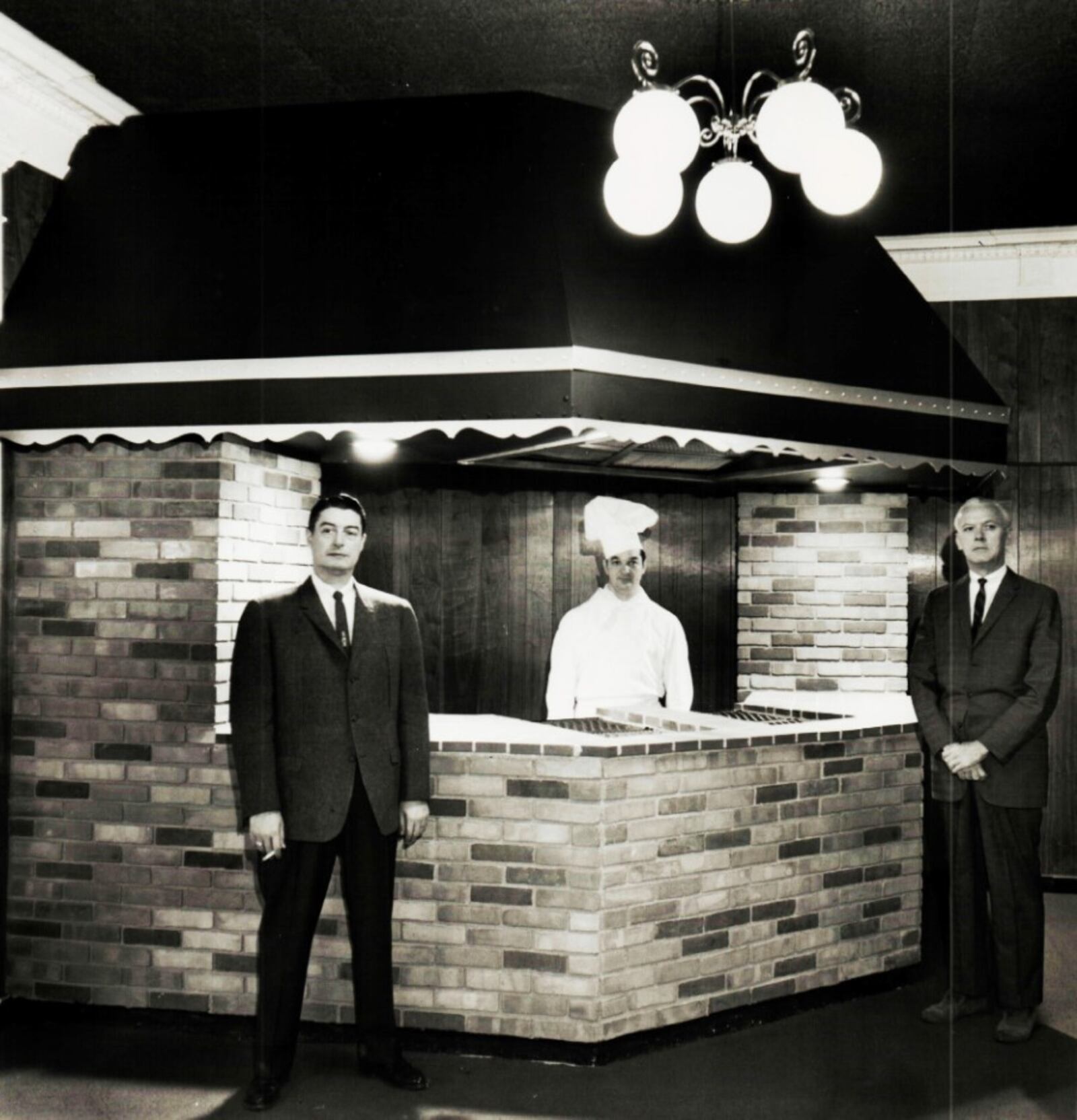 At the opening of the Gay Belle restaurant and nightclub owner LaMarr Bittinger is to the left with Chef Bill McClaflin center and hotel manager Walter Roush to the right. CONTRIBUTED/ Butler County Historical Society
