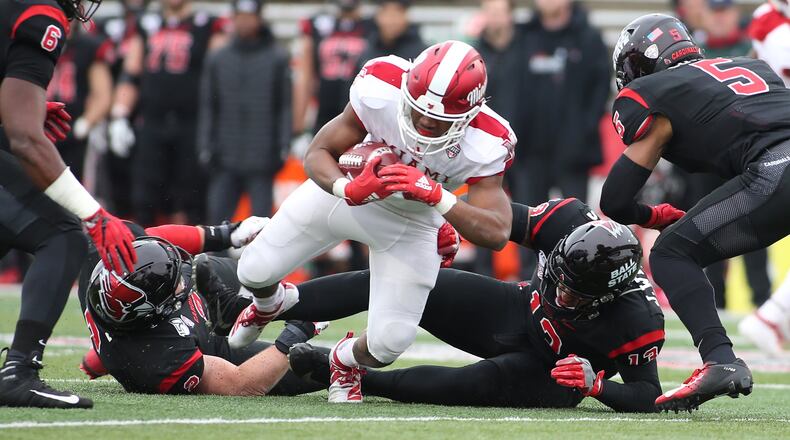 MUNCIE, INDIANA - NOVEMBER 29: Tyre Shelton #20 of the Miami of Ohio Redhawks runs the ball in the game against the Ball State Cardinals during the second quarter at Scheumann Stadium on November 29, 2019 in Muncie, Indiana. (Photo by Justin Casterline/Getty Images)
