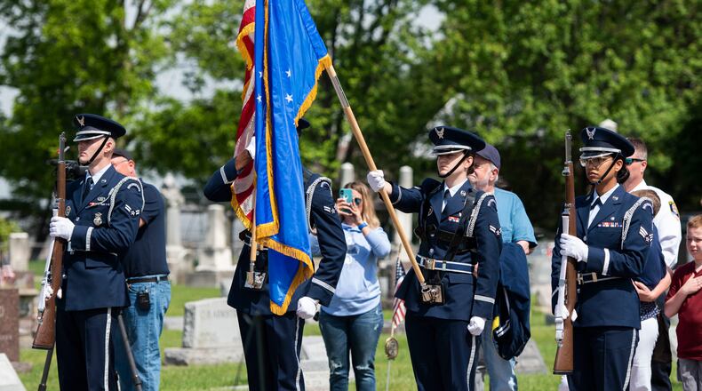 Honor Guard members from Wright-Patterson Air Force Base, Ohio, present the colors during a Memorial Day ceremony in Fairborn, Ohio, May 31, 2021. Established in 1971, Memorial Day is an official federal holiday meant to allow people to honor the men and women who have died while on duty with the U.S. Military. (U.S. Air Force photo by Wesley Farnsworth)