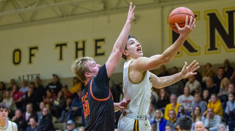 Alter's Anthony Ruffolo scores against Fenwick's Ryder Thompson during Alter's victory at home Tuesday night. CONTRIBUTED/Jeff Gilbert