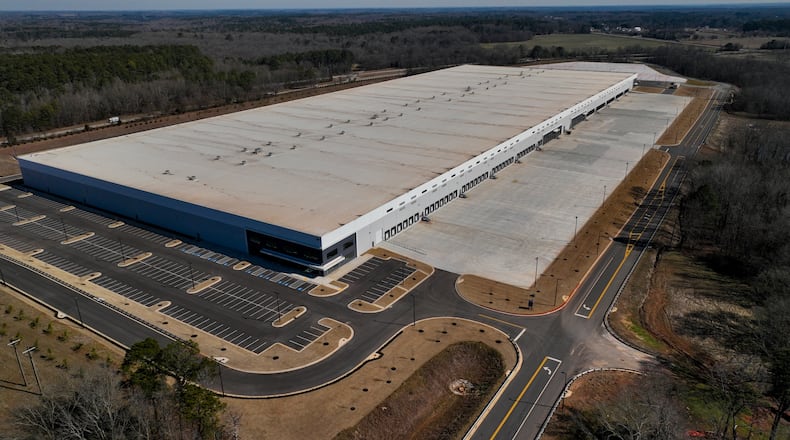 A newly built warehouse is seen on Friday, Feb. 6, 2026, in Social Circle, Ga., where officials are concerned about U.S. Immigrations and Customs Enforcement's plans connected to a $45-billion expansion of immigrant detention centers. (AP Photo/Mike Stewart)