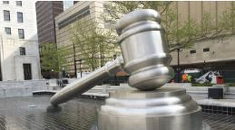 A Hamilton man faces 22 charges in what prosecutors call a foreclosure-relief scam.