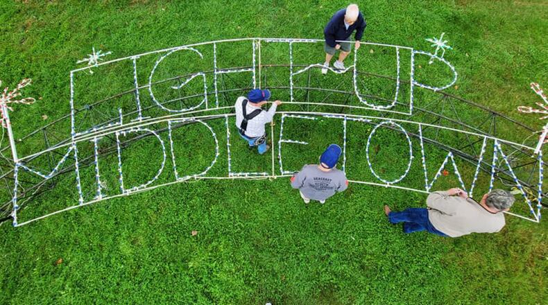 Members of the Grandpa Gang, a volunteer group, have been working hard installing displays for Light Up Middletown, a drive through holiday lights display at Smith Park in Middletown. LUM opened this week and runs from 6-10 p.m. every day through New Year's Eve. NICK GRAHAM/STAFF