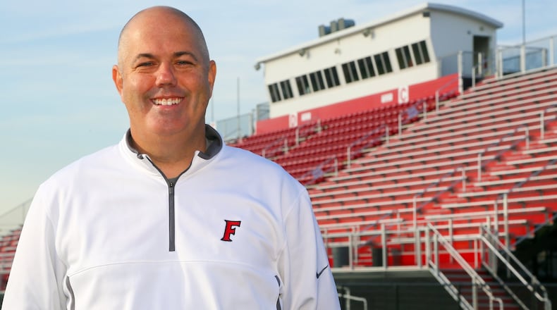 Former Fairfield Schools’ Athletic Director Mark Harden stands in their football stadium, Wednesday, Nov. 2, 2016. Harden, 52, died in a four-vehicle crash Wednesday, March 13, 2024, on Interstate 75 in Sharonville. GREG LYNCH / STAFF