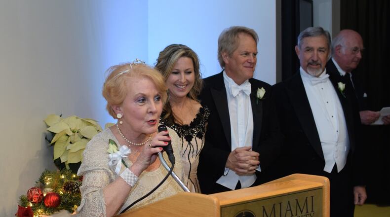 Frances Sack, one of the co-chairs of the 95th Charity Ball, addresses the crowd at Miami University Middletown. She was joined at the podium by (from left) chairs Jamie Murphy and Phillip Harrison and Dan Sack, and master of ceremonies John Renick. This year the 100th and final Charity Ball will be held in Middletown. CONTRIBUTED PHOTO