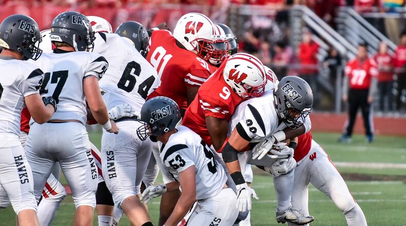 Lakota East’s Jack Dobrozsi carries the ball during their game against Lakota West on Sept. 29, 2017, at West. The Thunderhawks won that game 35-0. NICK GRAHAM/STAFF