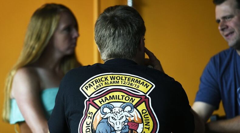 Hamilton s Municipal Brew Works will again tap its special Woltermelon Blonde Ale on Dec. 27 according to the brewery s CEO. Pictured are friends and family of Wolterman during the beer s 2016 limited release. NICK GRAHAM/STAFF