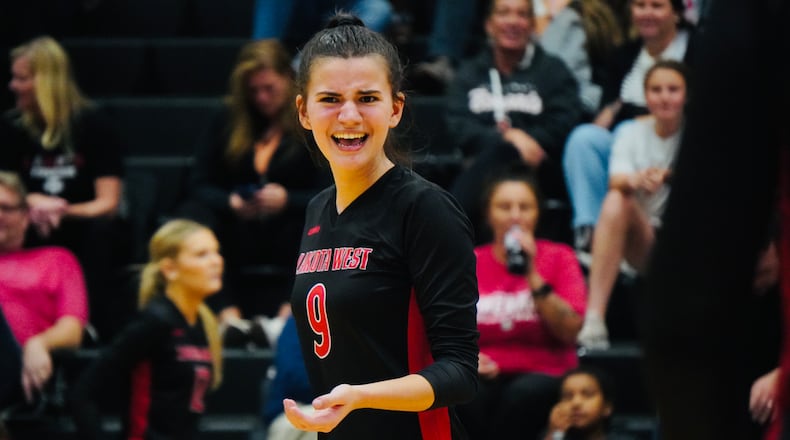 Lakota West's Megan Fuller (9) shows emotion during a match Lakota East on Wednesday night. Chris Vogt/CONTRIBUTED