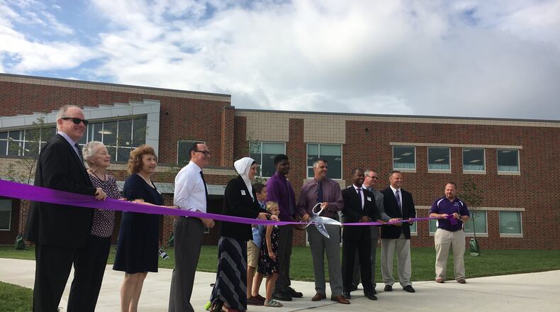 School and city officials cut the ribbon Saturday morning as Middletown Middle School opened to the public. Students return to school Tuesday.