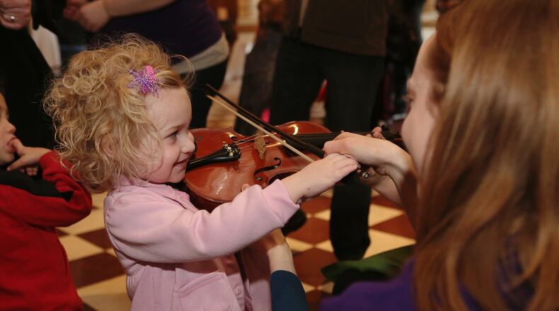 Participants of all ages enjoy a variety of local events and activities as part of Macy s Arts Sampler weekend.