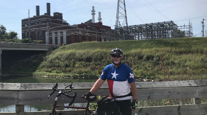 With the novel coronavirus, COVID-19, there cannot be a Great American Bike Rally this year, so co-organizer Dean Bruewer embarked on a 300-plus-mile fundraiser to help fill the void. Pictured is Bruewer near the start of the month in Hamilton, only 7 miles into his trip to Cleveland. He arrived in Cleveland on Saturday, Sept. 12, 2020. PROVIDED