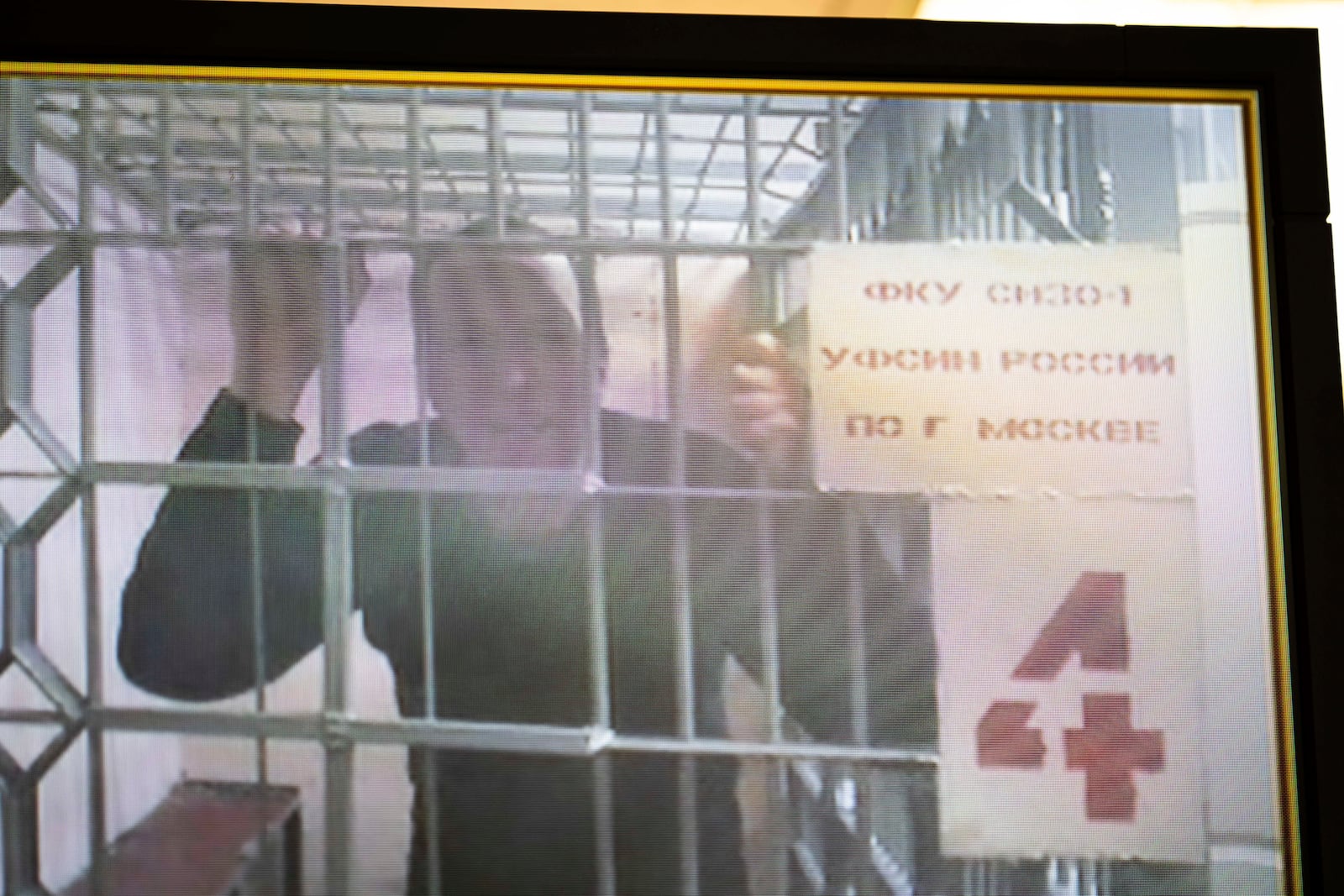 FILE - U.S. citizen Joseph Tater, who was detained for 15 days on charges of minor disorderly conduct in mid-August and then detained for a further two months on charges of attacking a police officer, is seen in a video link provided by the Russian Federal Penitentiary Service in the Moscow's City Court in Russia on Sept. 26, 2024. (AP Photo/Alexander Zemlianichenko, File)