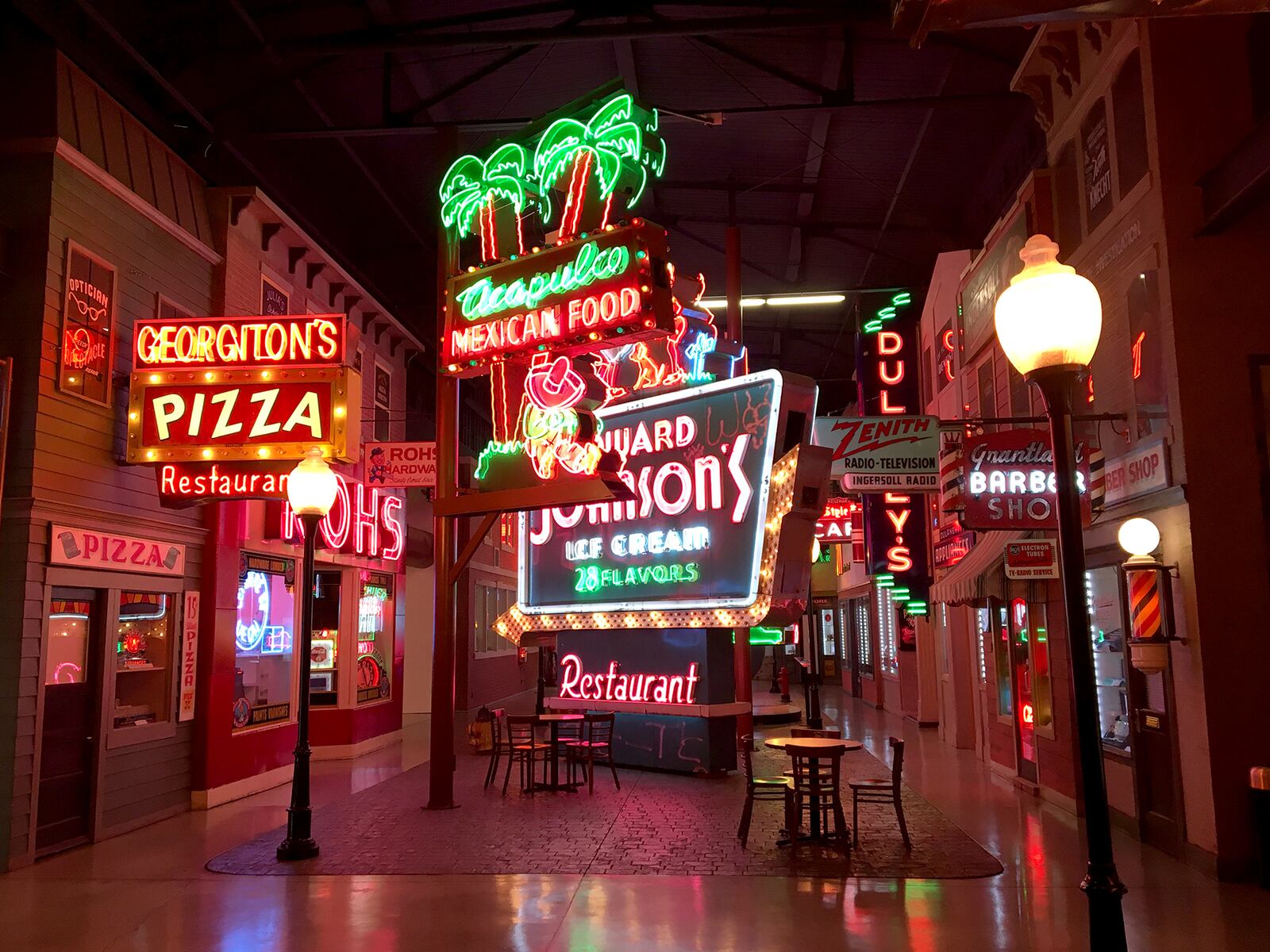 A streetscape filled with neon signs in the colors of the rainbow will transport you to another era at the American Sign Museum in Cincinnati. CHRIS STEWART / STAFF