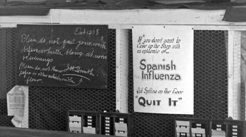 A sign posted in the Dayton-Wright Airplane Company in 1918 reads "If you don't want to close up the shop with an epidemic of Spanish Influenza quit spitting on the floor." DAYTON WRIGHT AIRPLANE COMPANY PHOTOGRAPHS / WRIGHT STATE UNIVERSITY SPECIAL COLLECTIONS