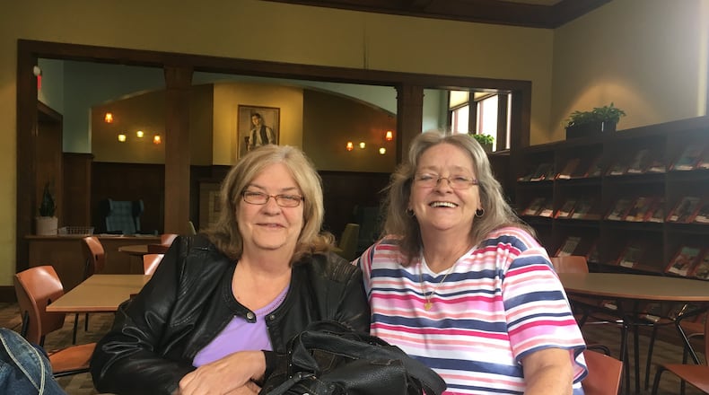 Debbie Burkhardt (left), of the Seven Mile area, and Cheryl Johnson, of Hamiltonn, have been good friends for decades because they’re so much alike. They had no idea how alike they were until they took tests through Ancestry.com. MIKE RUTLEDGE/STAFF