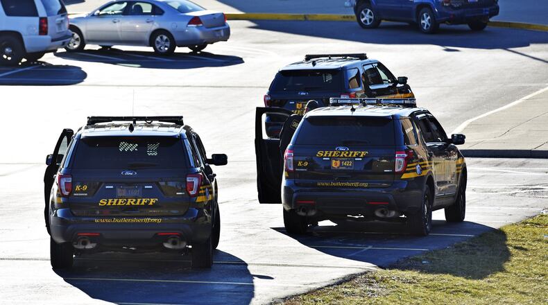 Butler County Sheriff’s Office deputies outside Madison Jr./Sr. High School after a shooting there Feb. 29. NICK GRAHAM/STAFF